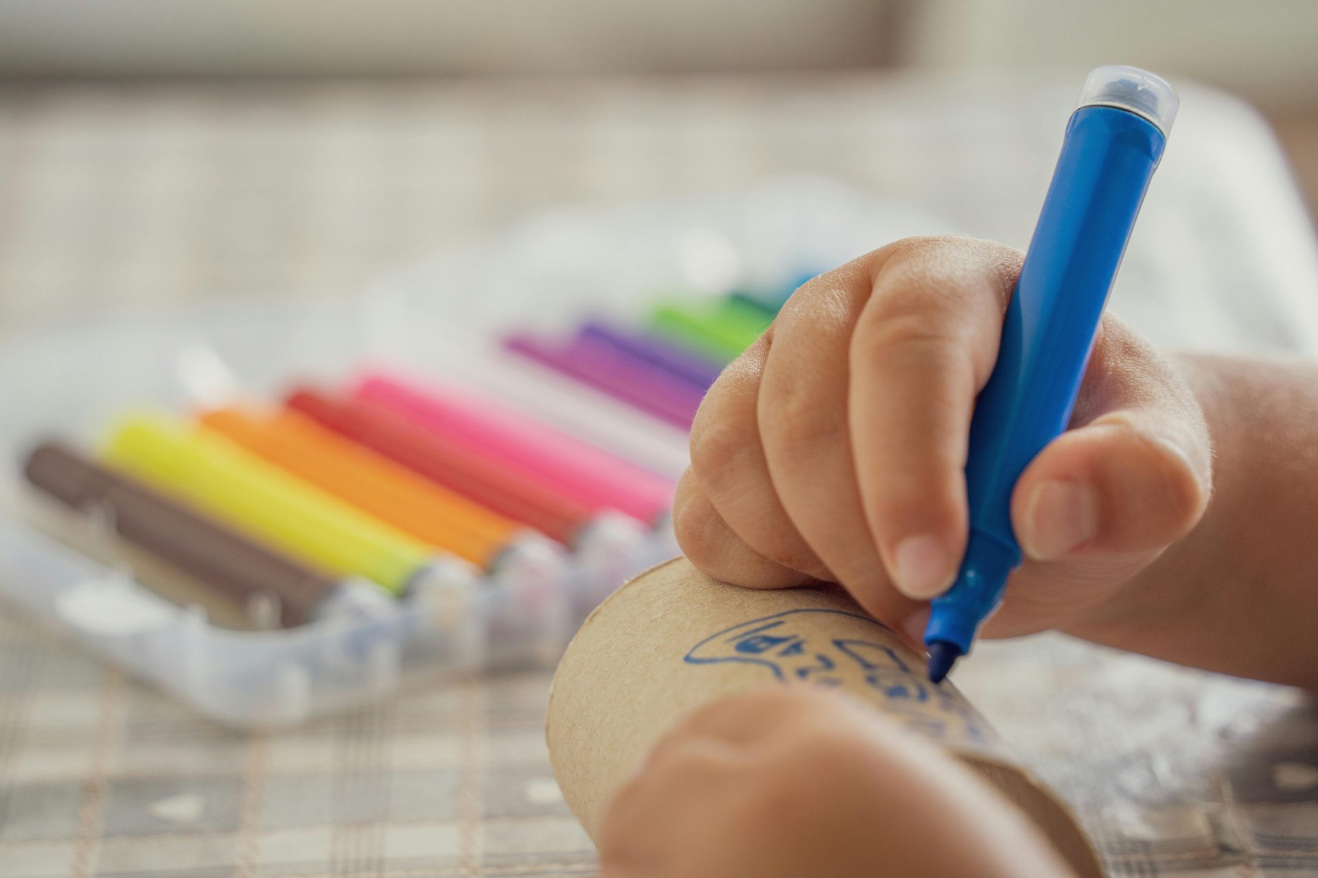 Child drawing art with felt-tip pen